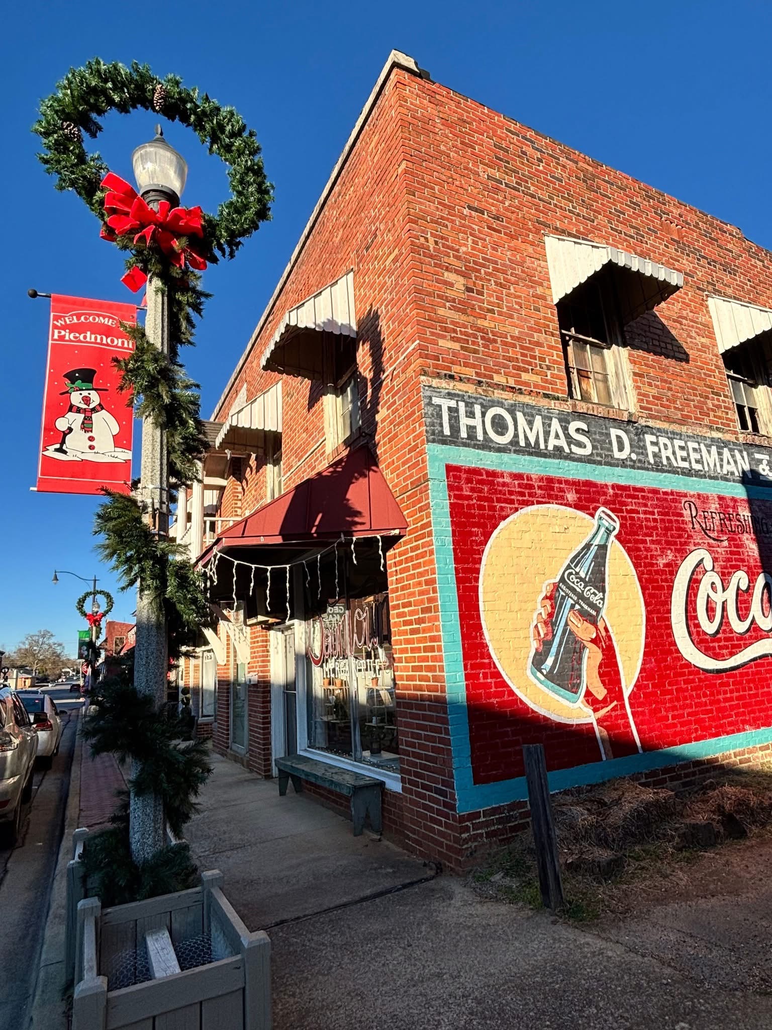 Coca-Cola mural on brick building in downtown Piedmont
