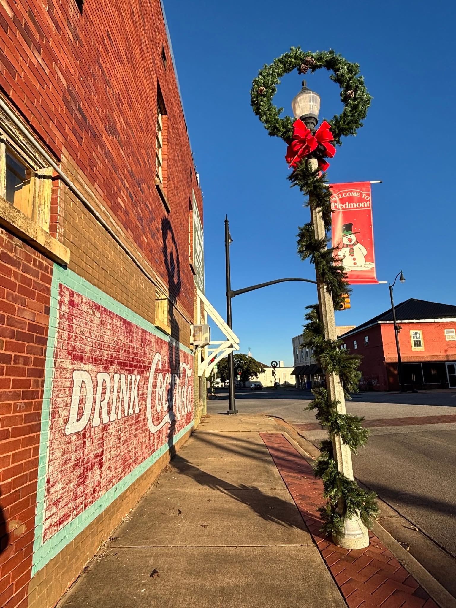 Downtown view with Welcome to Piedmont mural